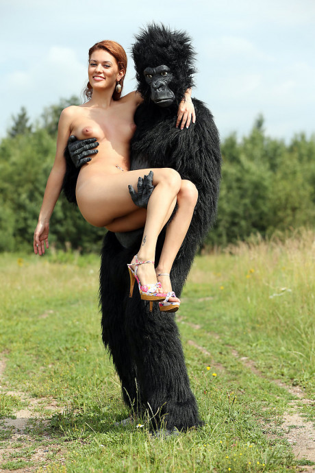 Charming red hair cosplay bitch lady Becca romps nude outdoors in heels with gorilla - #248832