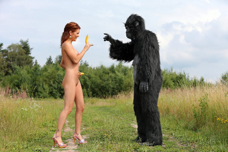 Charming red hair cosplay bitch lady Becca romps nude outdoors in heels with gorilla - #248834