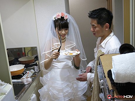 Japanese bride Ruri Narumiya rides on the floor after tasting a wedding cake - Image 2 of 20  in Skirt category   featuring Ruri Narumiya 