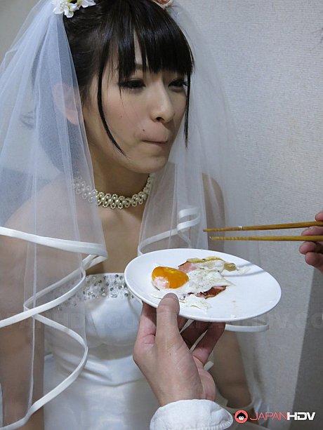 Japanese bride Ruri Narumiya rides on the floor after tasting a wedding cake - Image 3 of 20  in Skirt category   featuring Ruri Narumiya 