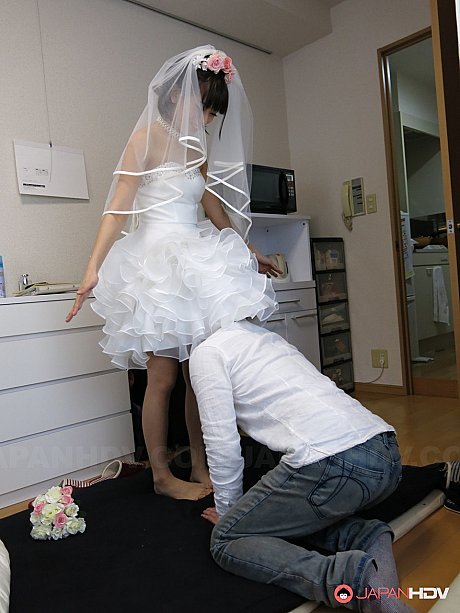 Japanese bride Ruri Narumiya rides on the floor after tasting a wedding cake - Image 4 of 20  in Skirt category   featuring Ruri Narumiya 