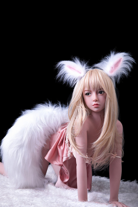 Blondie sex doll in bunny ears Chiaki posing naked and in a pink dress