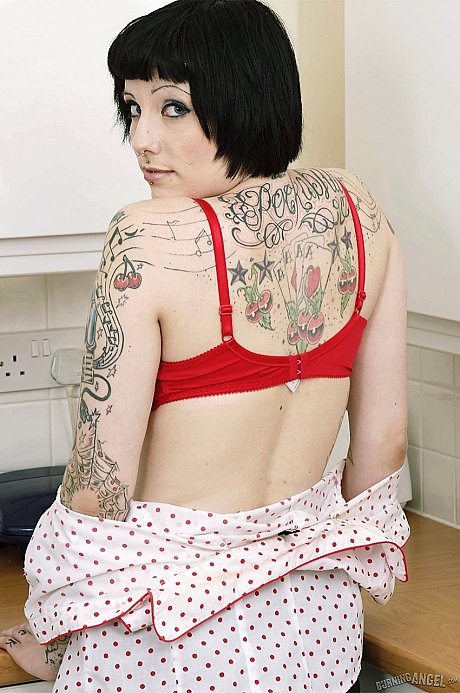 Tall inked goth peels in the kitchenette to flaunt her tats & vagina on the counter - Image 6 of 17  in Pussy category  