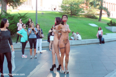 Stunning girls are tied together during a public humiliation session - #233044