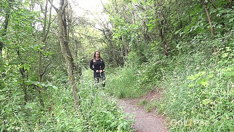 Naomi Benet takes a piss on a forest path while out for a walk