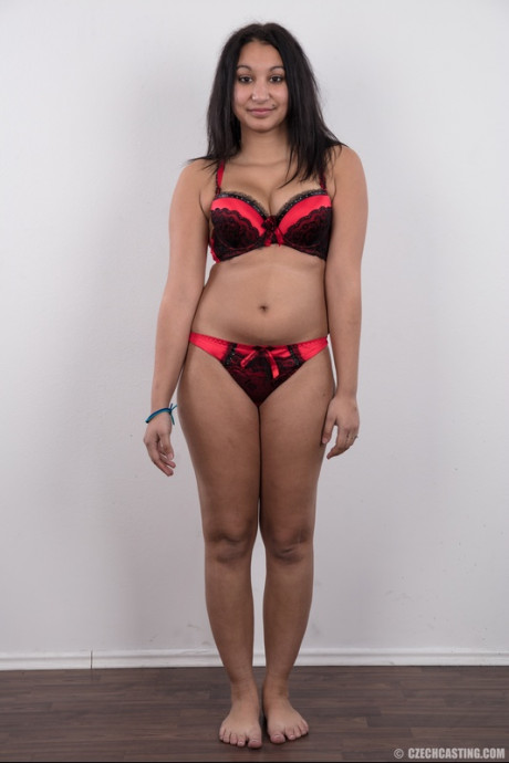 Chubby brunette Monika models completely clothed before getting totally nude - #1542784