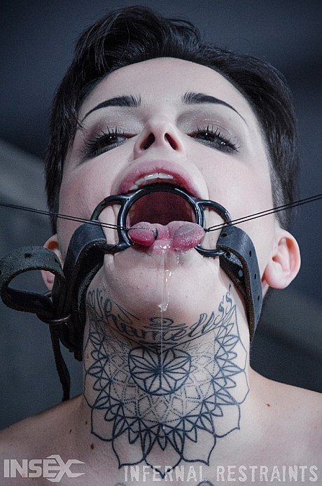 Tattooed female Leigh Raven has her moth forced open during BDSM play - Image 7 of 14  in Pussy category   featuring Leigh Raven 