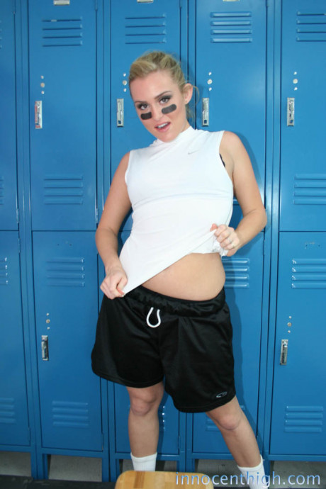 Pretty footballer Ruby Ryder strips her uniform to pose nude in the locker room - #818325