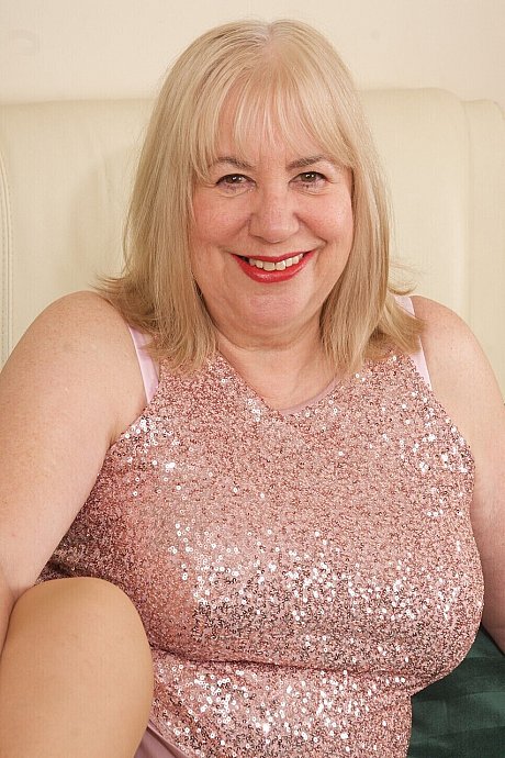 Older blonde Speedy Bee finger mounts her twat on a bed in tan pantyhose - Image 15 of 16  in Upskirt category   featuring Speedy Bee 