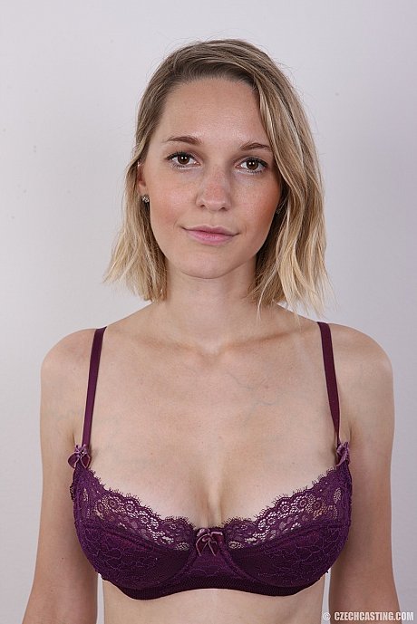 European female Tereza wears no expression while undressing for rent money - Image 4 of 20  in Close Up category   featuring Tereza 