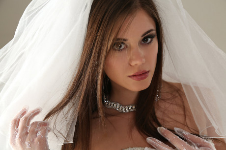 Glamour model Little Caprice strips off her wedding dress