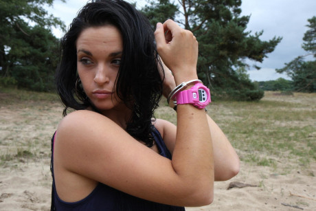 Brunette girl GF woman Nora is handcuffed to a tree while wearing a pink G-Shock watch - #542038