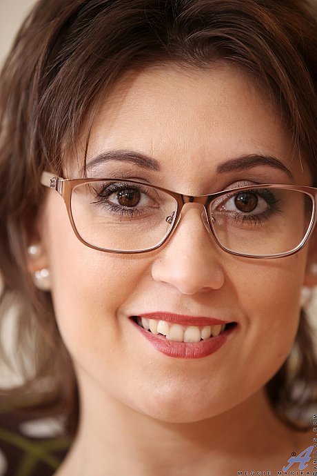 Czech MILF with glasses Meggie Marika rubs her bushy clit as she strips nude - Image 12 of 20  in Pussy category   featuring Meggie Marika 