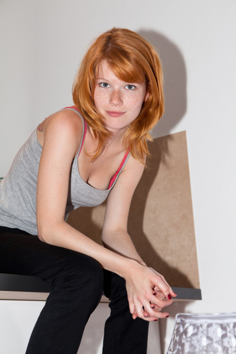 Czech redhead Mia Sollis showcases her medium titties and spreads her bald beaver - #1145598