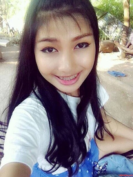 Lovely oriental transsexual with braces Wine posing in her public compilation - Image 6 of 21  in Ladyboy category   featuring Ladyboy Wine 