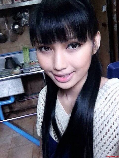 Lovely oriental transsexual with braces Wine posing in her public compilation - Image 8 of 21  in Ladyboy category   featuring Ladyboy Wine 