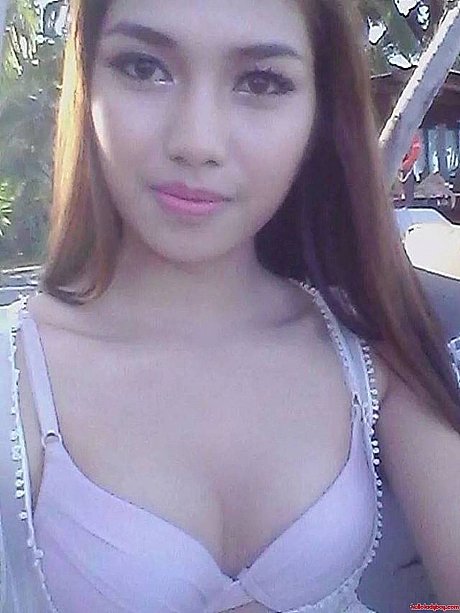 Lovely oriental transsexual with braces Wine posing in her public compilation - Image 15 of 21  in Ladyboy category   featuring Ladyboy Wine 