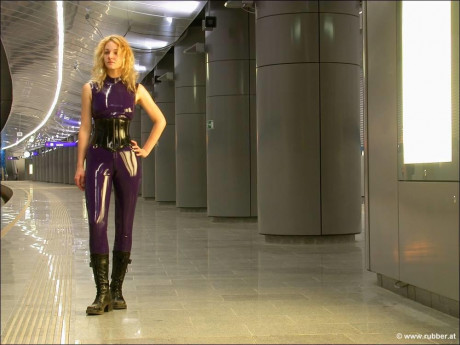 Caucasian female heads to the underground while wearing latex fetish wear