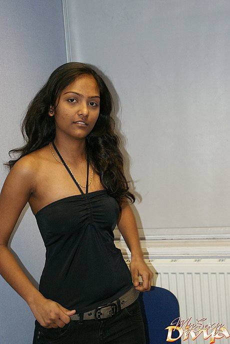 Desi solo chick girl broad holds her nice titties as she undresses to model in the nude - Image 4 of 12  in Babe category   featuring Divya 