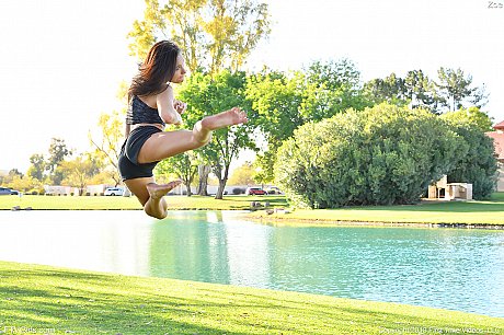 Teenage hottie in cute outfit Zoe doing exercise outdoors by the water - Image 6 of 20  in Model category   featuring Zoe Bloom 
