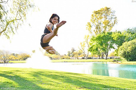 Teenage hottie in cute outfit Zoe doing exercise outdoors by the water - Image 10 of 20  in Model category   featuring Zoe Bloom 