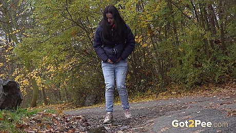 Dark-haired skank girlfriend lady pulls down her jeans to take a piss while out for a walk - Image 2 of 15  in Pussy category   featuring Helen 