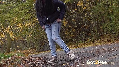 Dark-haired skank girlfriend lady pulls down her jeans to take a piss while out for a walk - Image 14 of 15  in Pussy category   featuring Helen 