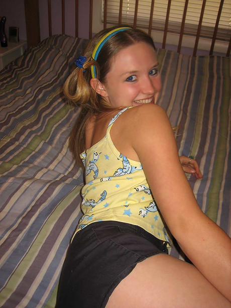 Pretty MILF Kitty removes her shorts & panties before toying her holes - #812447