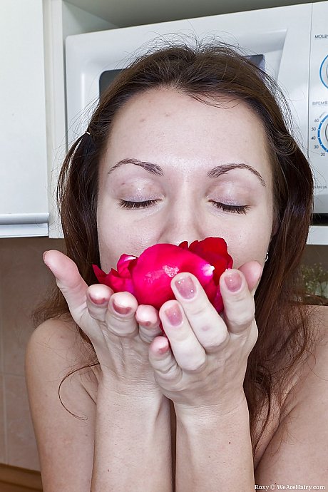 Lusty babe with bushy slit stripping and licking her nipples - Image 15 of 16  in Pussy category   featuring Roxy 