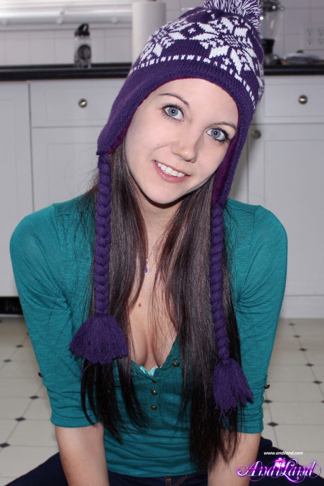 Amateur model Andi Land pulls down her pants while wearing a toque
