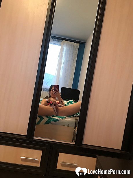 Amateur honey with small melons posing naked in front of a mirror - Image 10 of 20  in Teen category  