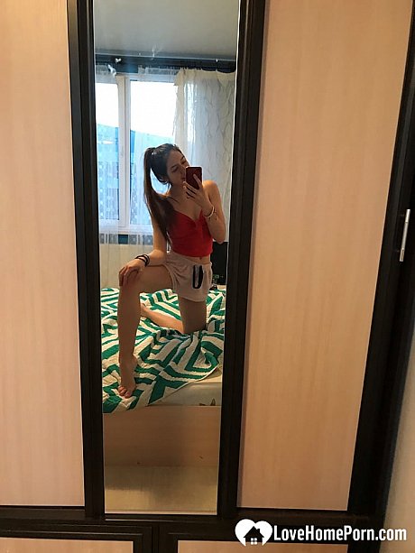 Amateur honey with small melons posing naked in front of a mirror - Image 18 of 20  in Teen category  