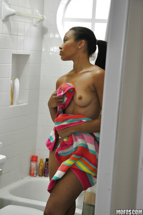 Ebony Adrian Maya undressing and taking shower in voyeur scene - #670509