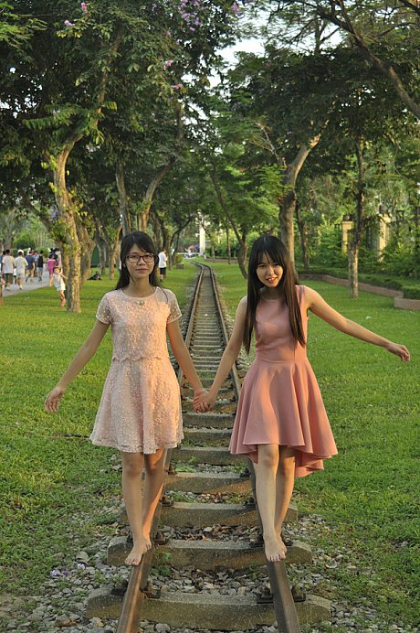Beautiful chinese bitches posing in their charming delicious dresses on the railroad - Image 4 of 21  in Sexy category  