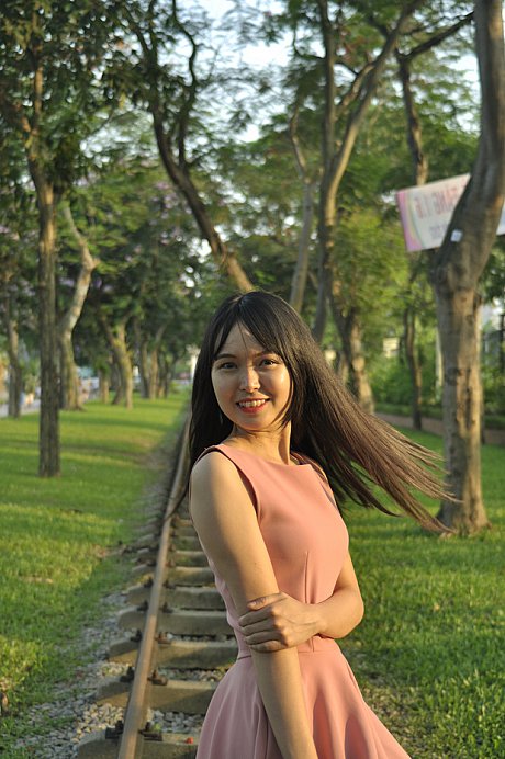 Beautiful chinese bitches posing in their charming delicious dresses on the railroad