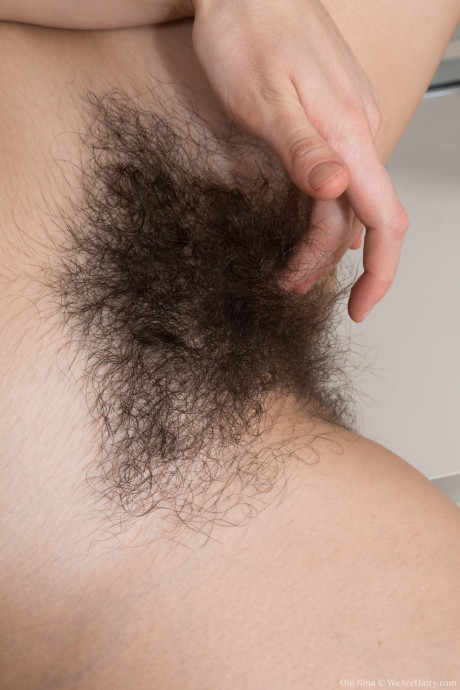 Ole Nina shows silky pits & spreads hairy snatch for attractive fingering on camera - #1443160