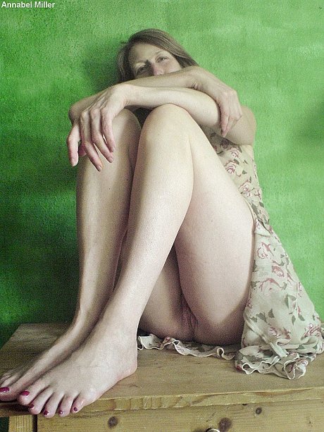 Gorgeous MILF flashes her twat wearing a charming dress without panties - Image 5 of 12  in Spreading category   featuring Annabel Miller 