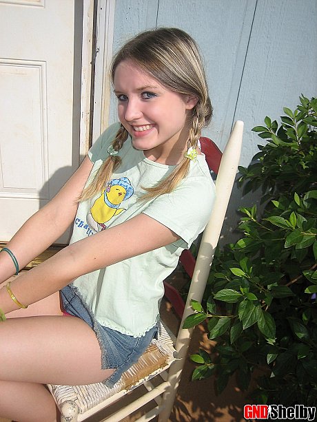 Young teenie bitch gf woman smokes a cigarette while exposing her melons and pussy