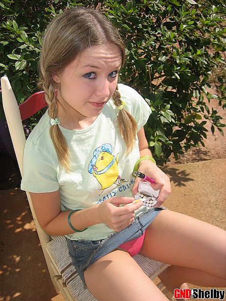 Young teenie bitch gf woman smokes a cigarette while exposing her melons and pussy - Image 2 of 12  in Outdoor category  