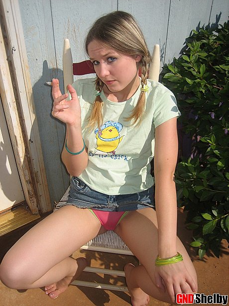 Young teenie bitch gf woman smokes a cigarette while exposing her melons and pussy - Image 10 of 12  in Outdoor category  
