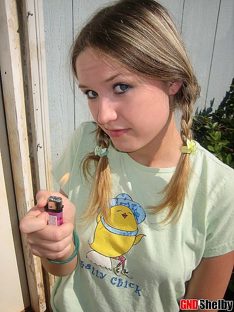 Young teenie bitch gf woman smokes a cigarette while exposing her melons and pussy - Image 11 of 12  in Outdoor category  