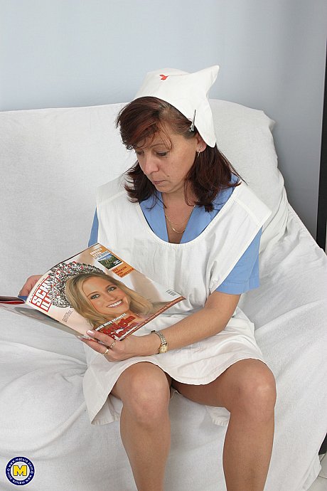 Older European nurse Natalie takes a stiff knob in her juicy snatch on a sofa - Image 19 of 21  in Cumshot category   featuring Natalie 