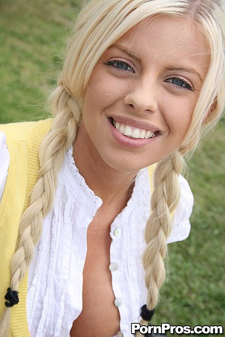 Young with blue eyes & fake melons Britney Amber teases with her cleavage outside - Image 2 of 16  in Outdoor category   featuring Britney Amber 