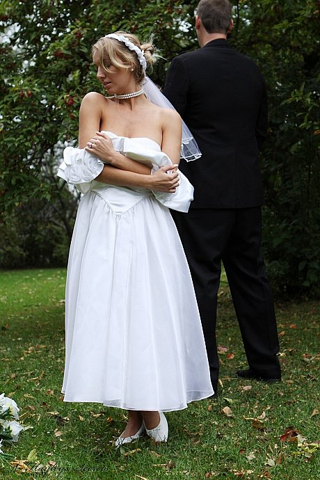 Blondie bride Hayley Marie Coppin gets undressed on a lawn while taking her vows - Image 3 of 12  in Outdoor category   featuring Hayley Marie Coppin 