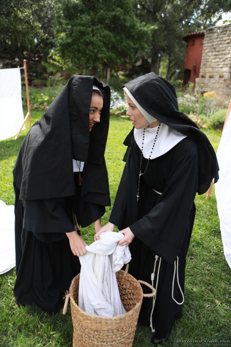 Kinky nuns Charlotte Stokely and Lily Adams please each other on grass
