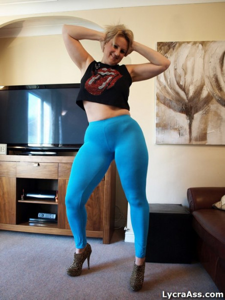 Mature BBW Daniella English frees her bush from yoga pants and thong panties - #1181351
