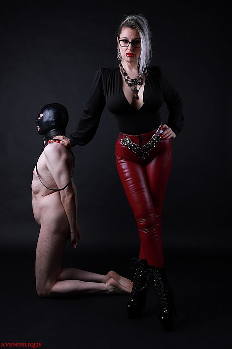 Platinum blondie Avengelique forces a naked male slave to the ground - Image 8 of 16  in Ass category   featuring Avengelique 