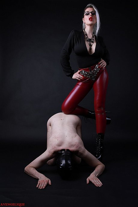 Platinum blondie Avengelique forces a naked male slave to the ground - Image 15 of 16  in Ass category   featuring Avengelique 