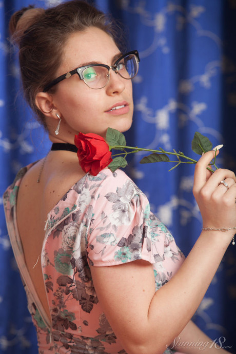 Nerdy 18 year older Liza Loo holds a rose showing her firm boobs in glasses - #54669