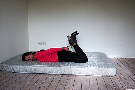 Fully clothed female sub Lena hog tied & ball gagged in high heel boots - Image 1 of 17  in Outdoor category   featuring Lena 